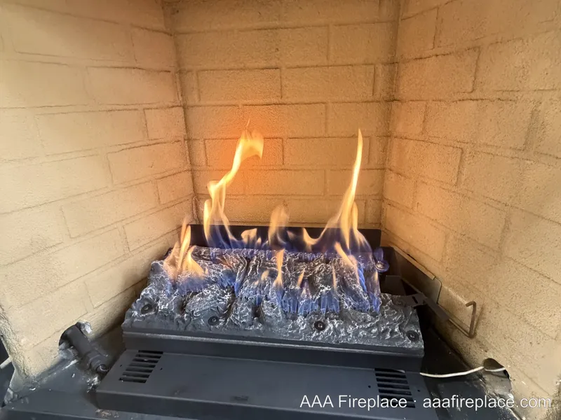 New gas burner test fired in the firebox before log placement